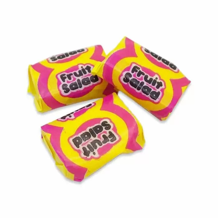 Colourful chewy fruit salad sweets with mixed fruit flavours