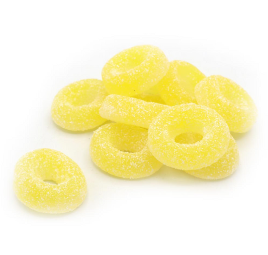 Yellow and white sugar-coated pineapple ring jelly sweets